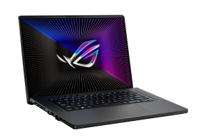 Off center shot of the front of the ROG Zephyrus G16, with the ROG Fearless Eye logo on screen